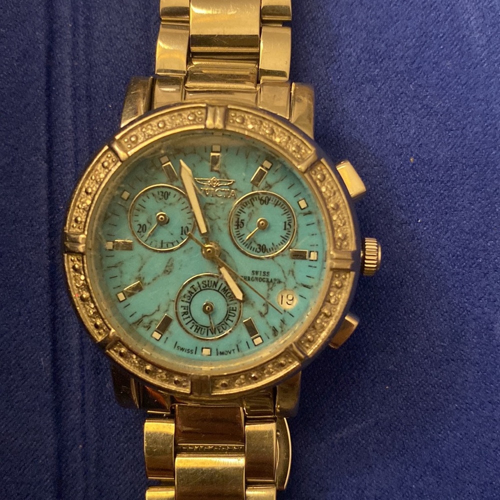 Invicta 0281 Watch - beautiful turquoise with diamond-cut around face